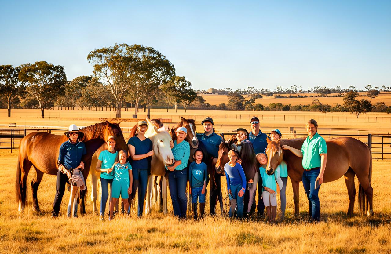 A small group gathered with horses in a sunny Riverina paddock near Leeton